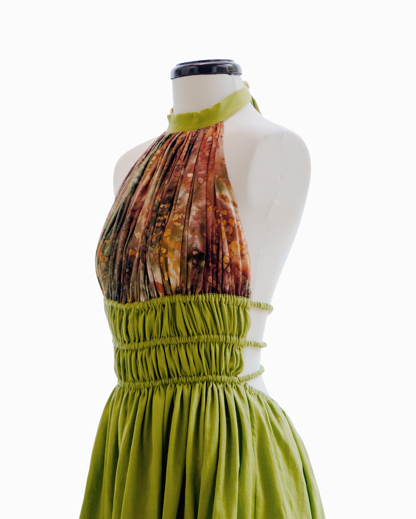 Linen dress with batik-dyed cotton fabric.